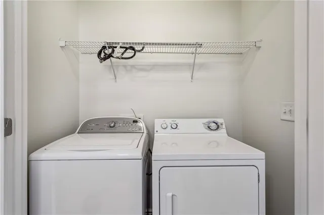 an empty room with a empty space and windows