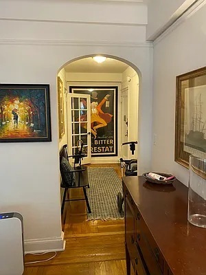 a view of a lobby with furniture and staircase