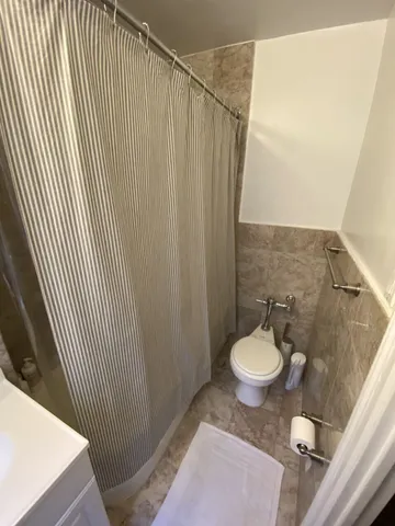 a kitchen with a sink and a stove top oven