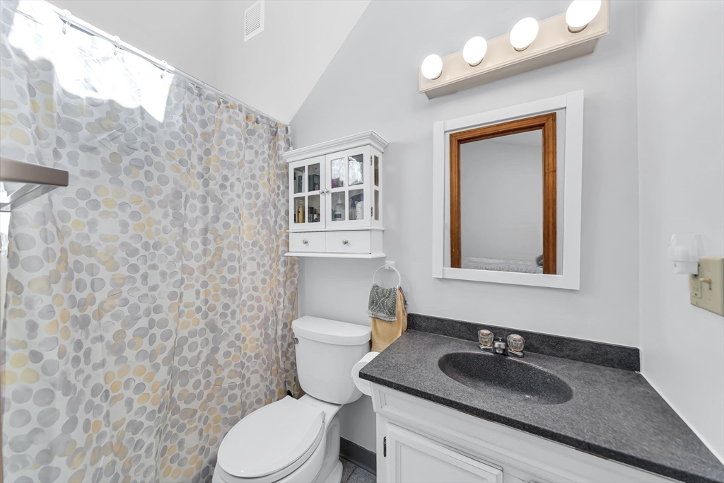 21 Martin Farms Road Hampden, MA 01036 - Photo 21 of 42 a bathroom with a toilet sink vanity granite and mirror