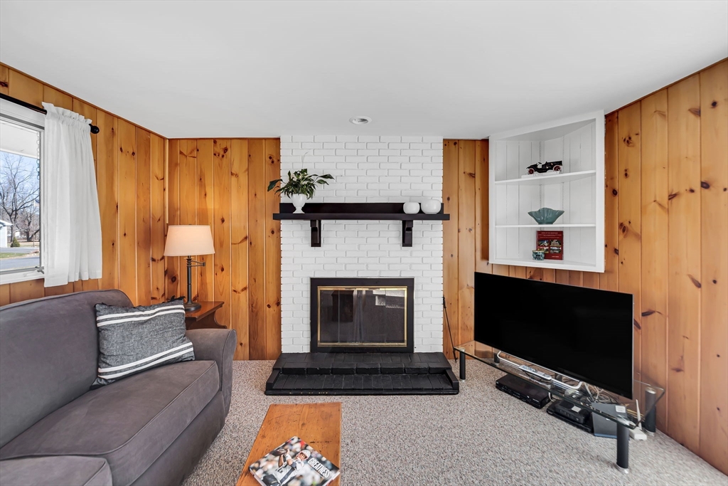 21 Martin Farms Road Hampden, MA 01036 - Photo 3 of 42 a living room with furniture and a fireplace
