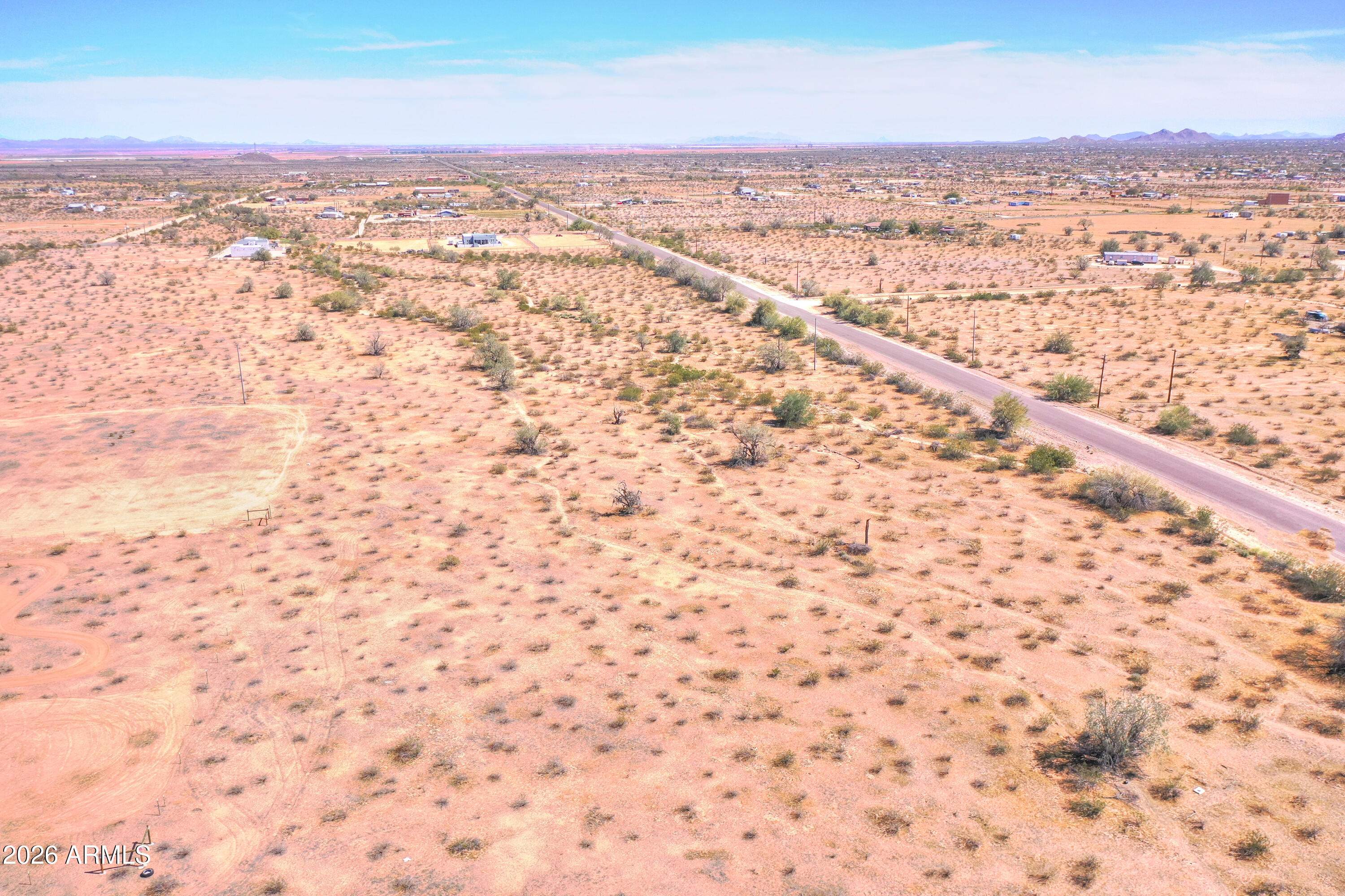 an aerial view of beach and city space