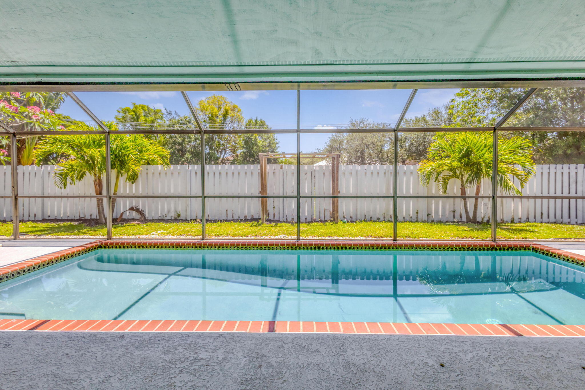 120 Bayberry Circle Jupiter, FL 33458 - Photo 10 of 37 Pool View from Living Area