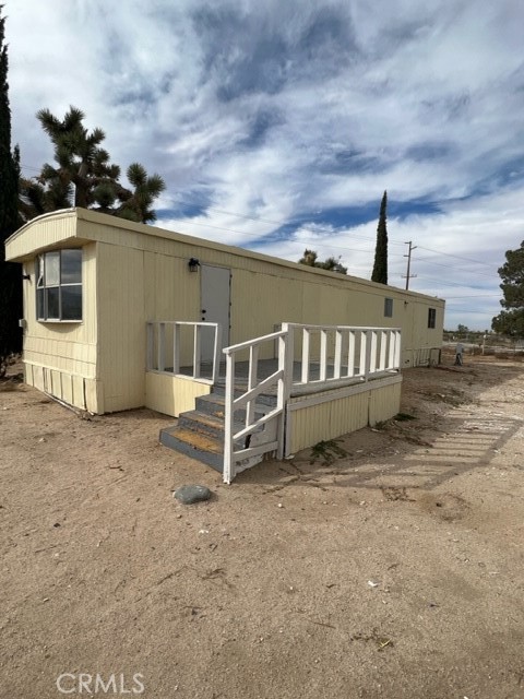 4949 Duncan Road Phelan, CA 92371 - Photo 1 of 1 a view of a house with a yard