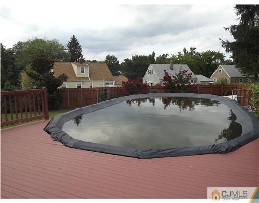 4 Halstead Road New Brunswick, NJ 08901 - Photo 13 of 17 a view of a swimming pool with a lake view