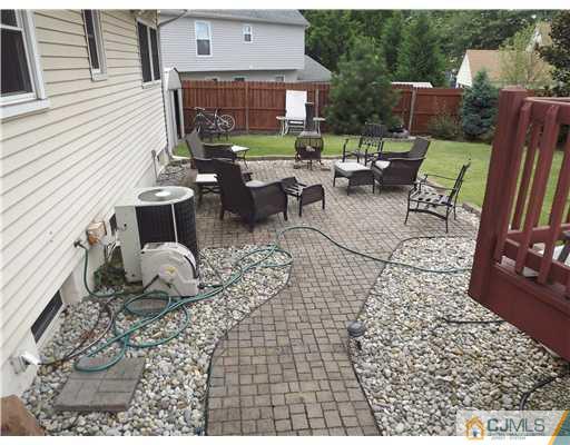 4 Halstead Road New Brunswick, NJ 08901 - Photo 15 of 17 a backyard of a house with outdoor seating