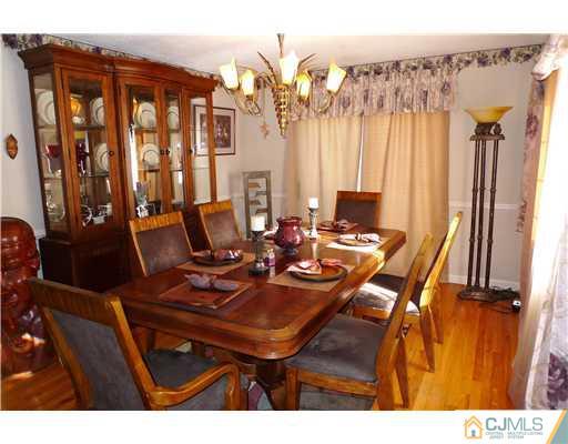 4 Halstead Road New Brunswick, NJ 08901 - Photo 3 of 17 a view of a dining room with furniture window and outside view