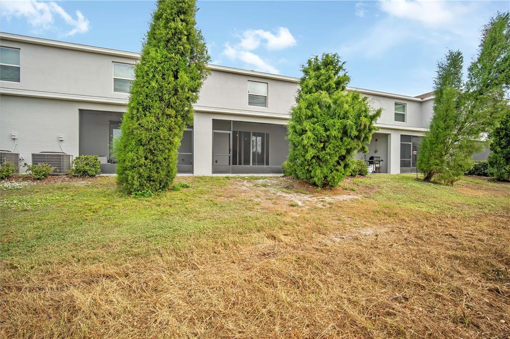 8619 Falling Blue Place Riverview, FL 33578 - Photo 23 of 27 a front view of a house with garden
