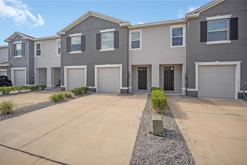 8619 Falling Blue Place Riverview, FL 33578 - Photo 3 of 27 a front view of a house with yard