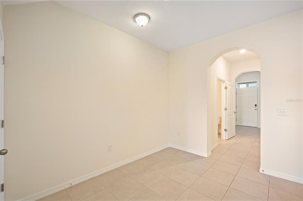 8619 Falling Blue Place Riverview, FL 33578 - Photo 8 of 27 an empty room with a bathroom