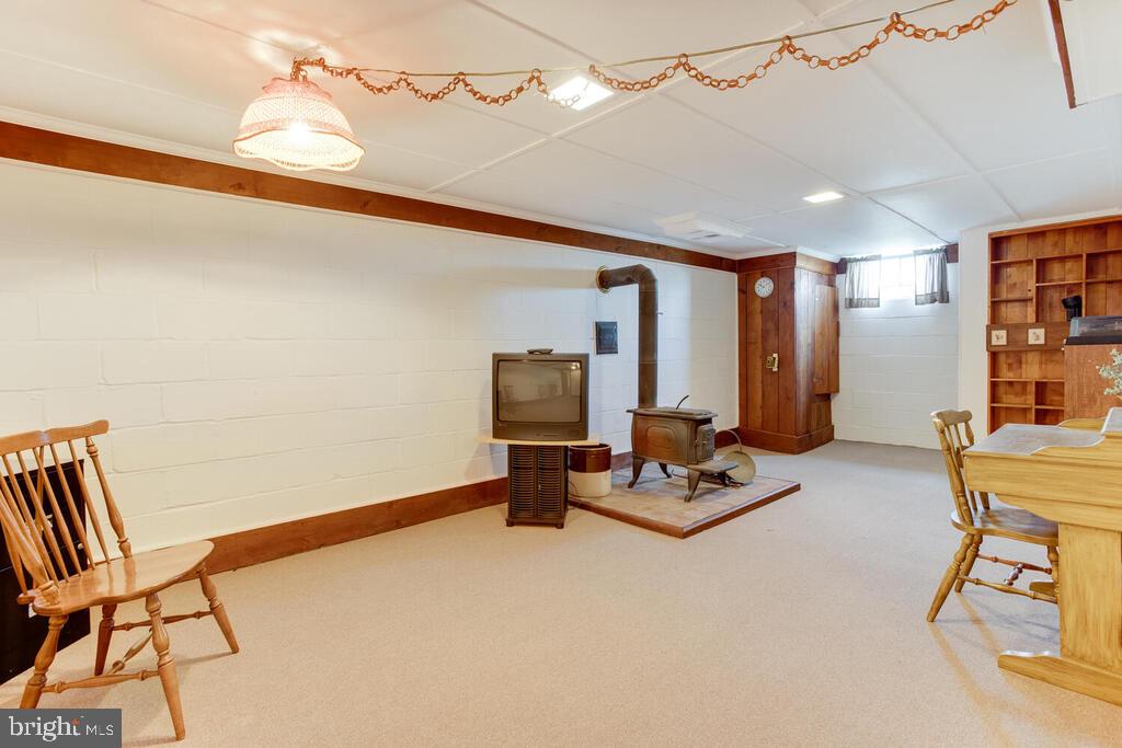 5506 Park Road Baltimore, MD 21225 - Photo 29 of 37 Lower Level Family Room w/wood burning stove