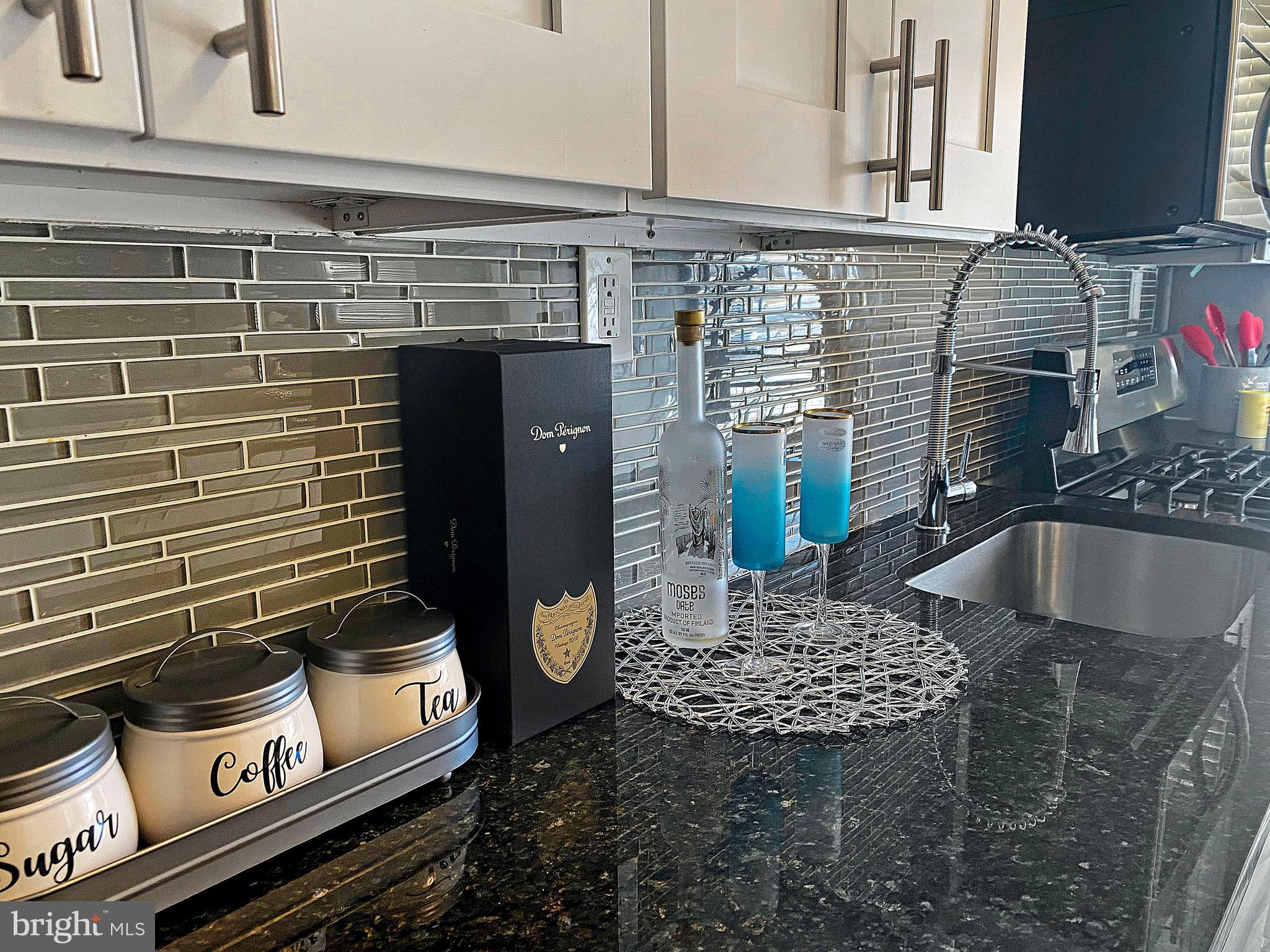 Granite countertops high-tech faucet.