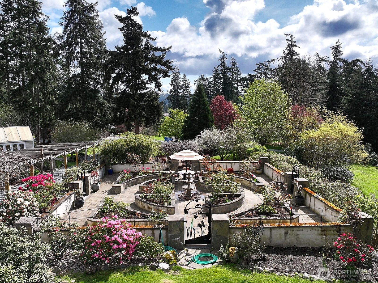 5741 Crow Haven Road Langley, WA 98260 - Photo 11 of 40 a view of a city with flower garden