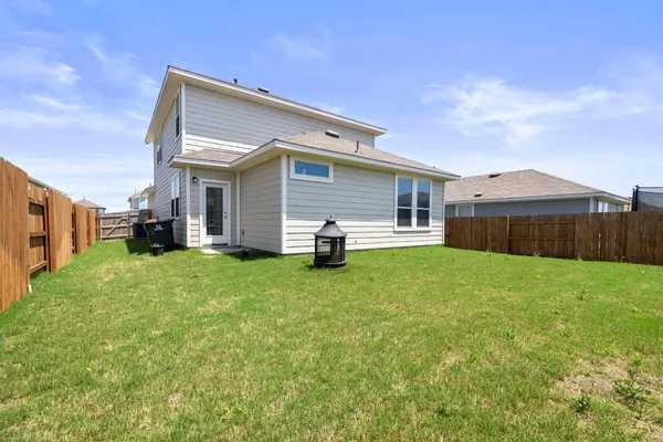 a front view of house with yard