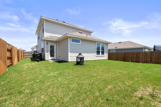 a front view of house with yard