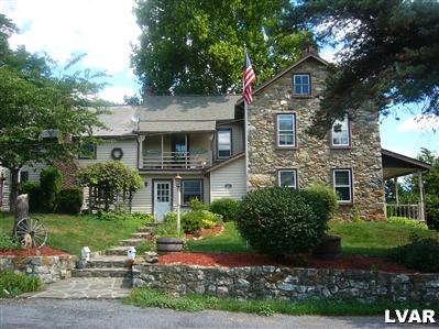6037 Vera Cruz Road Center Valley, PA 18034 - Photo 1 of 7 Main Entrance Flagstone walkway and wall!
