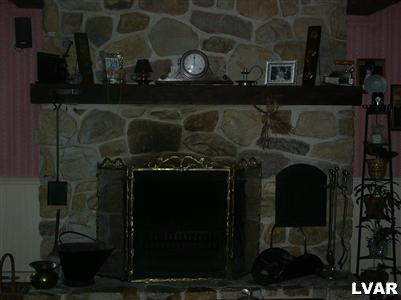 6037 Vera Cruz Road Center Valley, PA 18034 - Photo 5 of 7 Family room with floor to ceiling fireplace