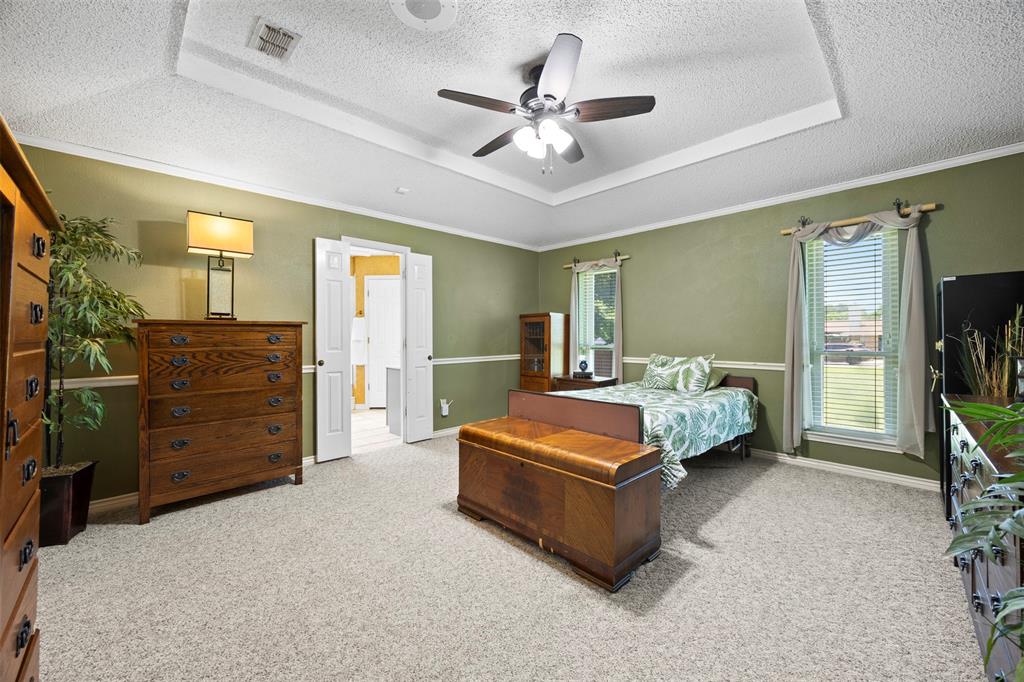 5610 Springbrook Drive Midlothian, TX 76065 - Photo 13 of 39 Primary bedroom with ensuite bath