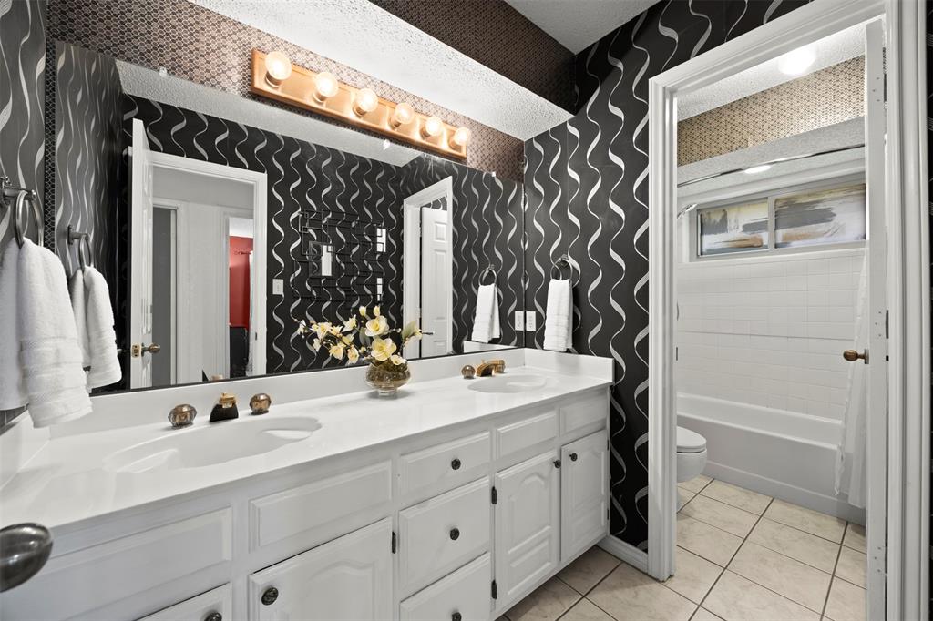 5610 Springbrook Drive Midlothian, TX 76065 - Photo 18 of 39 Full Guest Bathroom with fun character!