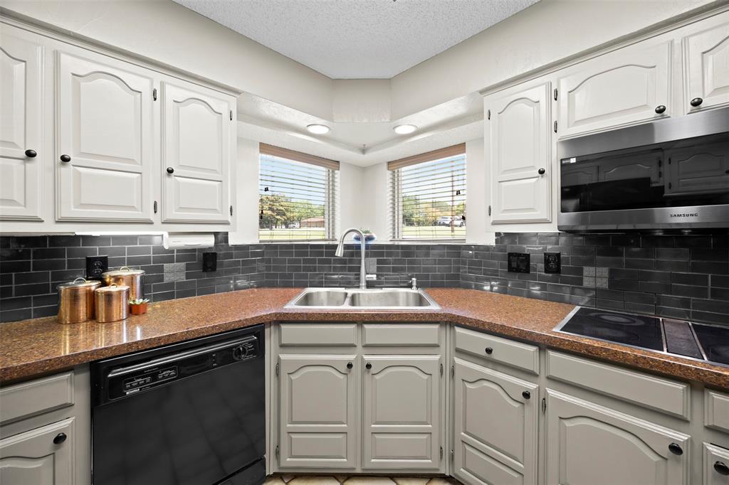 5610 Springbrook Drive Midlothian, TX 76065 - Photo 10 of 39 Give me a sink that overlooks my yard any day!