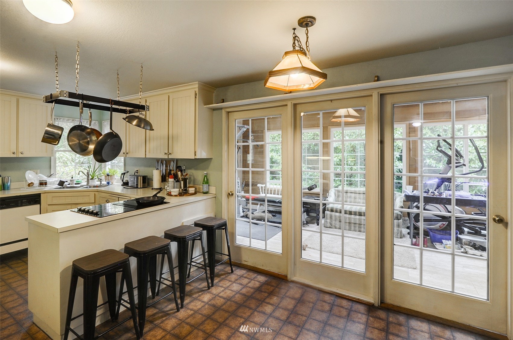 20414 West Richmond Road Bothell, WA 98021 - Photo 11 of 30 a very nice looking dining room with a large window and kitchen view