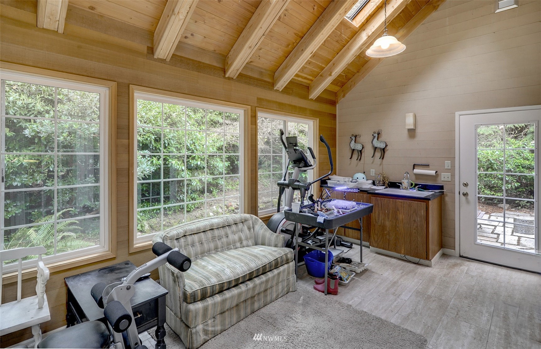20414 West Richmond Road Bothell, WA 98021 - Photo 13 of 30 a living room with furniture and a large window
