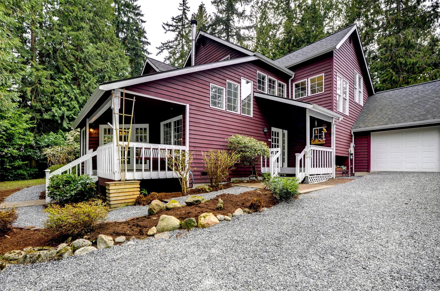 20414 West Richmond Road Bothell, WA 98021 - Photo 2 of 30 a front view of a house with garden