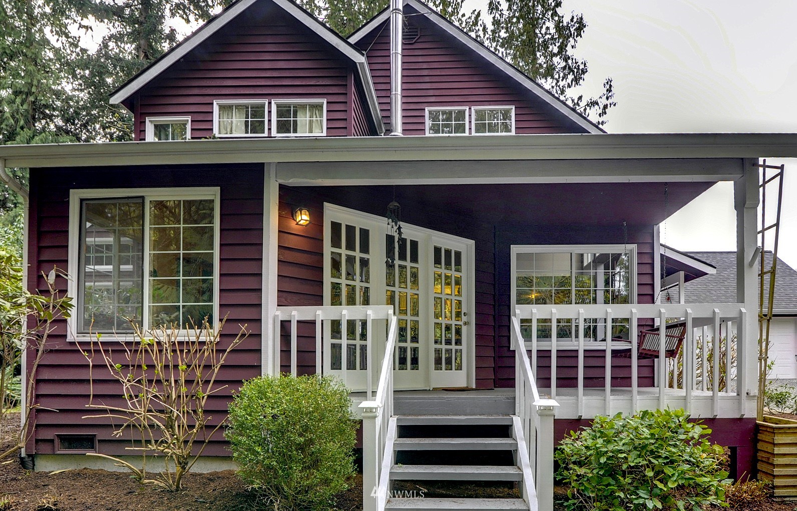 20414 West Richmond Road Bothell, WA 98021 - Photo 3 of 30 a front view of a house with a yard