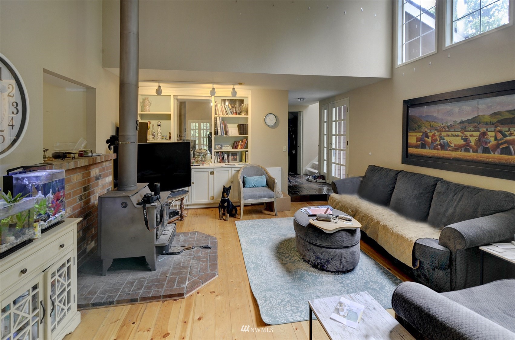 20414 West Richmond Road Bothell, WA 98021 - Photo 6 of 30 a living room with furniture and a flat screen tv