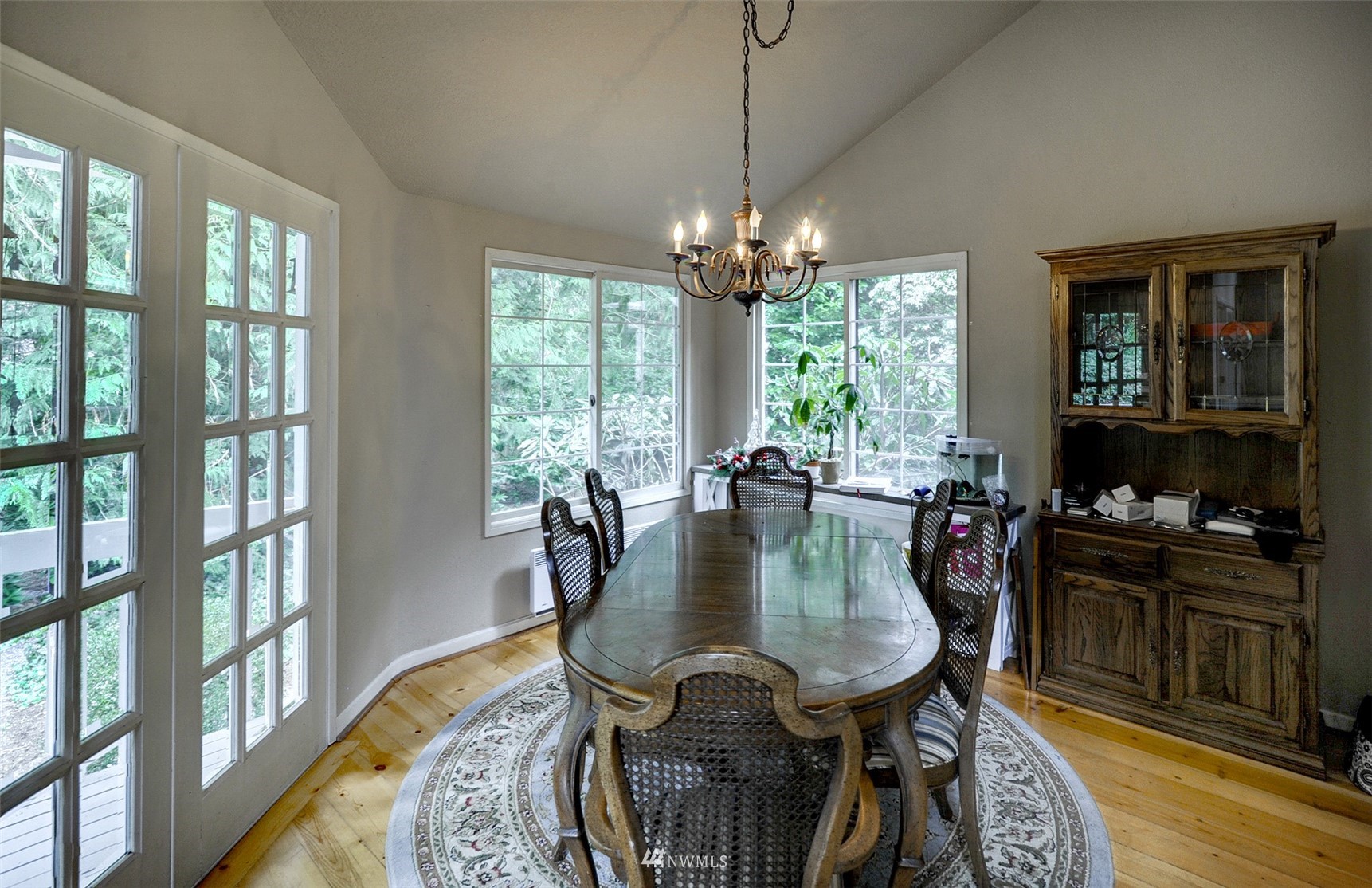 20414 West Richmond Road Bothell, WA 98021 - Photo 7 of 30 a view of a dining room with furniture window and outside view