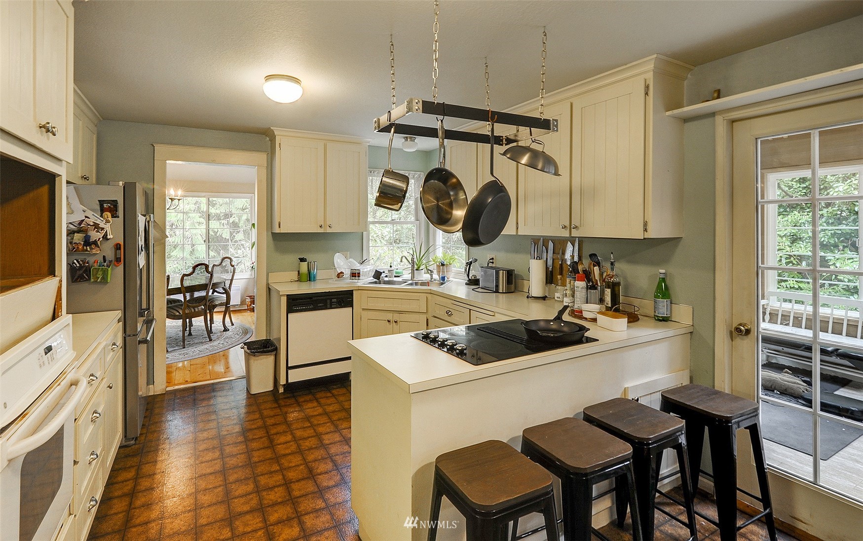 20414 West Richmond Road Bothell, WA 98021 - Photo 9 of 30 a kitchen with a sink appliances and cabinets