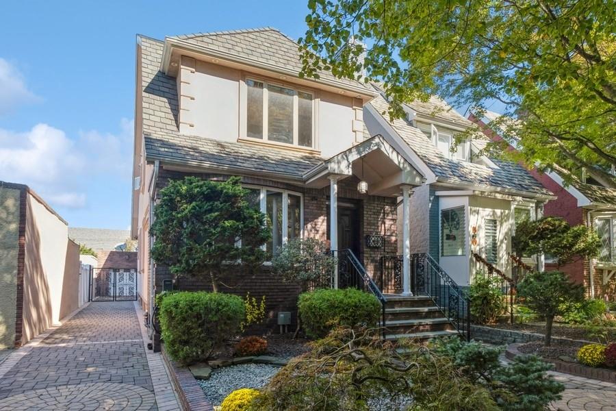 211 81st Street Brooklyn, NY 11209 - Photo 1 of 35 a front view of a house with garden