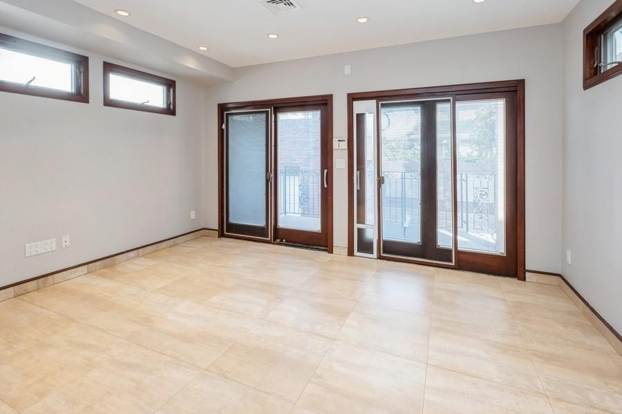 211 81st Street Brooklyn, NY 11209 - Photo 16 of 35 a view of an empty room with a window