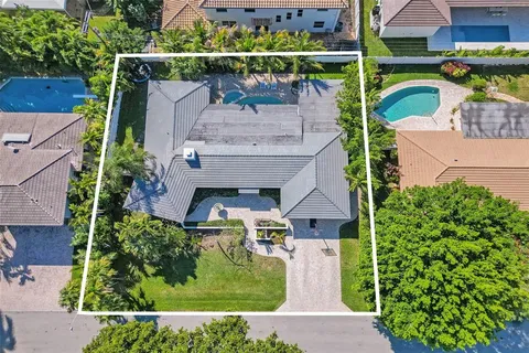 an aerial view of a house with a garden view