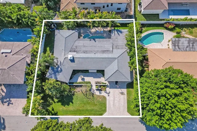 an aerial view of a house with a garden view