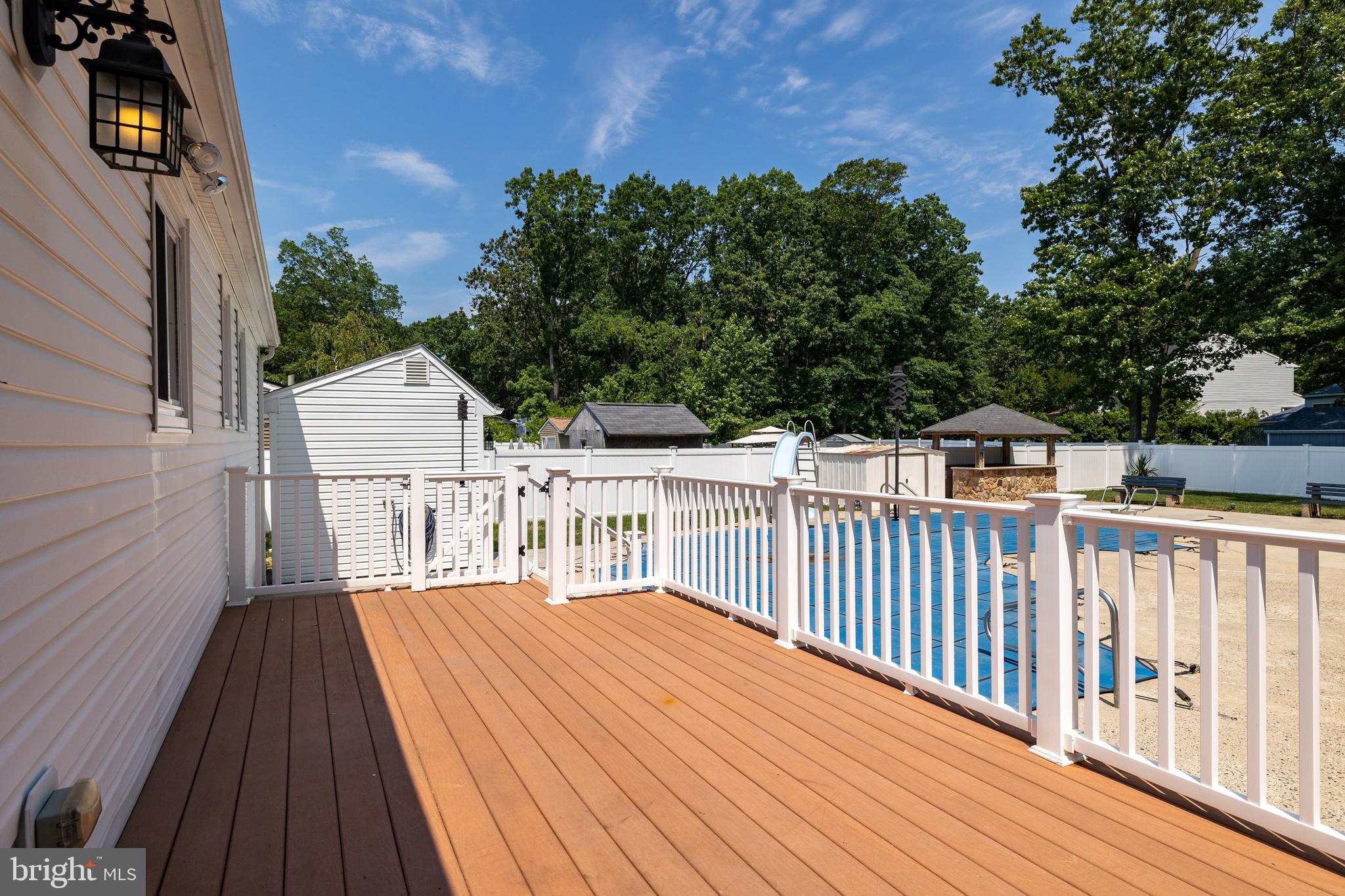 78 Estates Road Pine Hill, NJ 08021 - Photo 31 of 45 Trex deck off kitchen