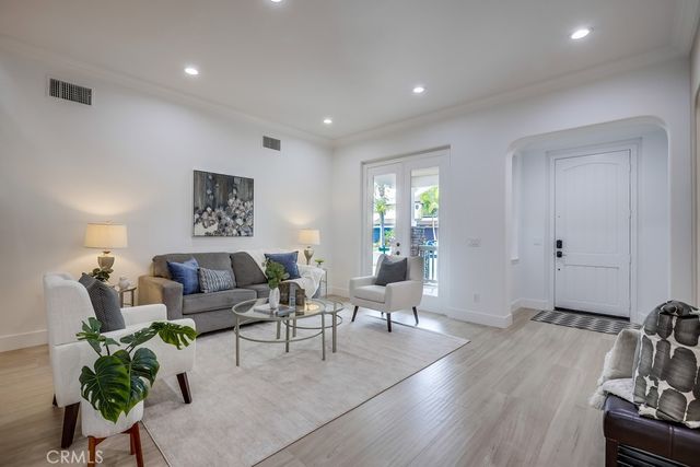 a bathroom with a shower and a sink