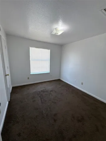 a bathroom with a sink toilet and mirror