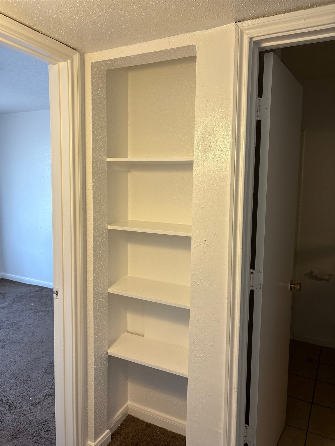 7201 Hallshire Drive, Unit 233 Houston, TX 77016 - Photo 5 of 12 a view of an empty room