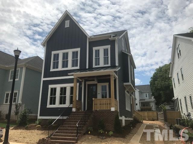 1005 Norris Street Raleigh, NC 27604 - Photo 1 of 25 a front view of a house with many windows
