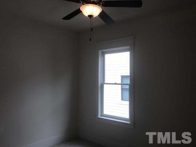 1005 Norris Street Raleigh, NC 27604 - Photo 19 of 25 a view of an empty room with a window