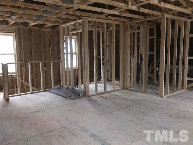 1005 Norris Street Raleigh, NC 27604 - Photo 25 of 25 a view of an empty room with wooden walls