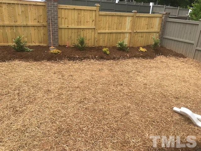 1005 Norris Street Raleigh, NC 27604 - Photo 6 of 25 a view of a backyard