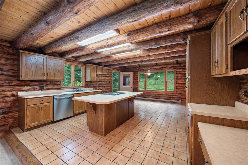 282 Merriman Road Sewickley, PA 15143 - Photo 11 of 25 a kitchen with a sink window and stainless steel appliances