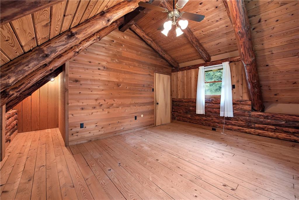 282 Merriman Road Sewickley, PA 15143 - Photo 16 of 25 a view of an empty room with wooden floor and a window