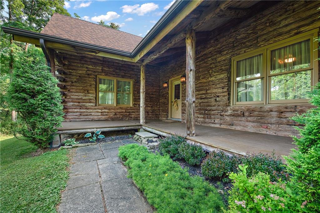 282 Merriman Road Sewickley, PA 15143 - Photo 2 of 25 a front view of a house with a yard