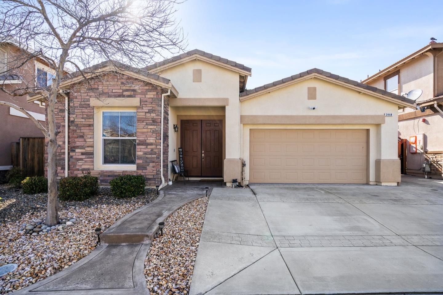 2448 Vallarta Drive Bay Point, CA 94565 - Photo 1 of 52 a view of a brick house with large windows