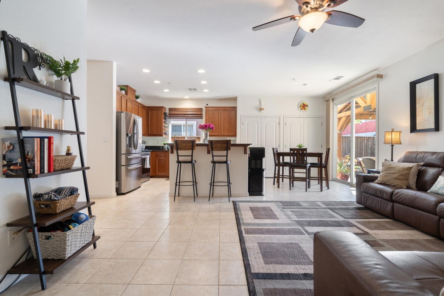 2448 Vallarta Drive Bay Point, CA 94565 - Photo 11 of 52 a living room with furniture kitchen view and a flat screen tv