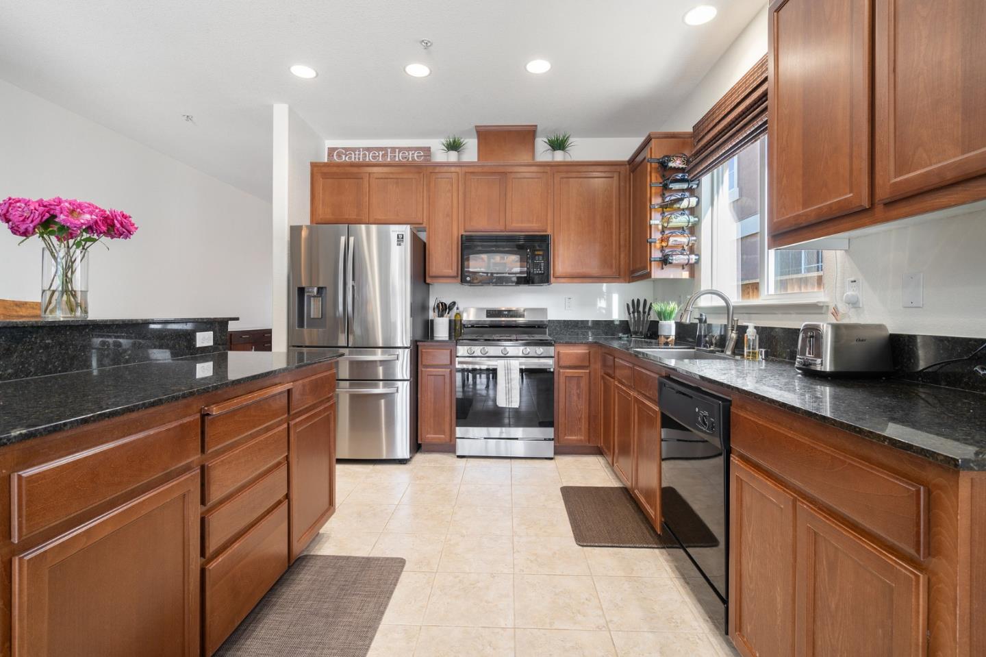 2448 Vallarta Drive Bay Point, CA 94565 - Photo 14 of 52 a kitchen with stainless steel appliances granite countertop a sink a stove and a refrigerator