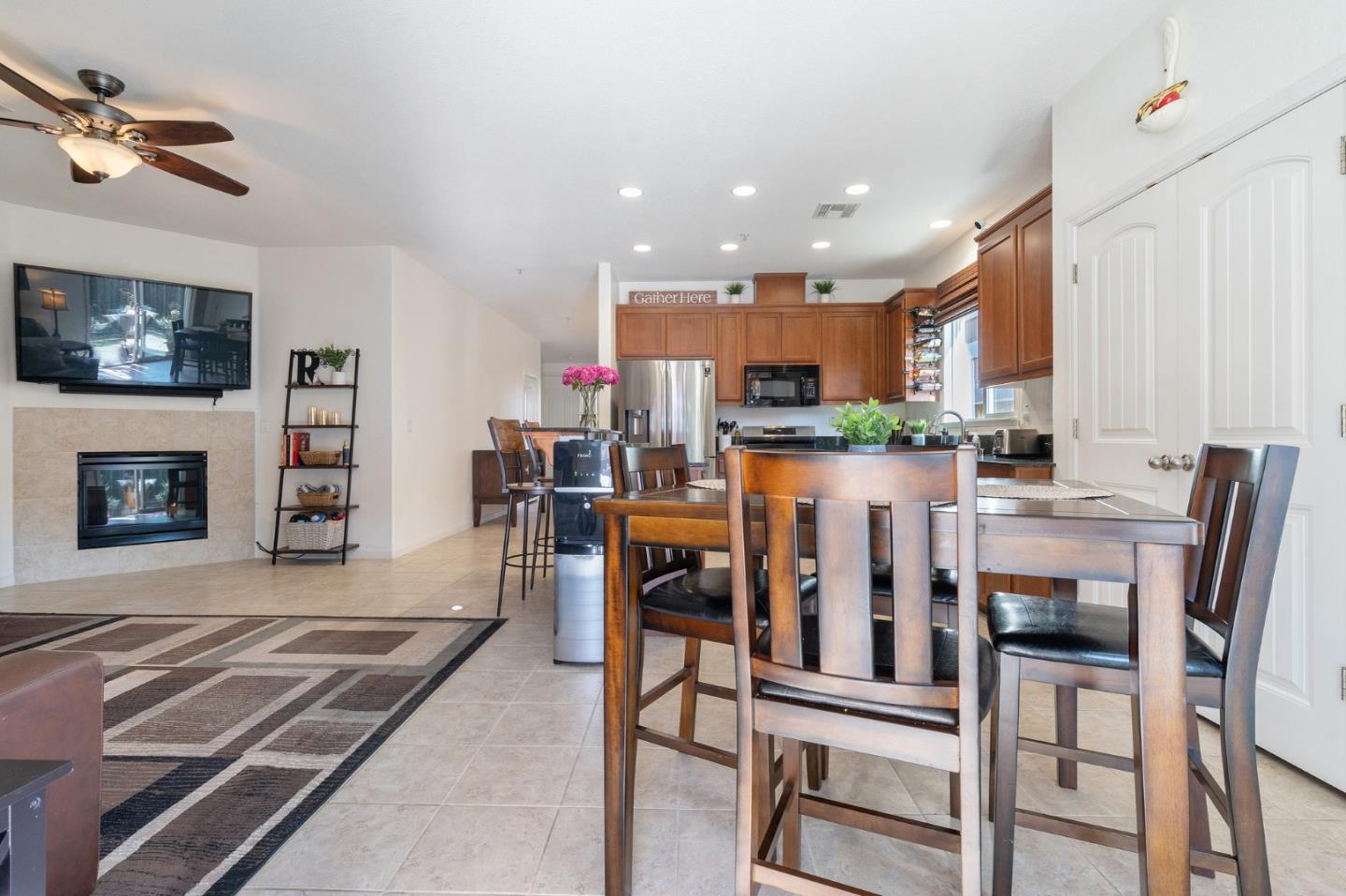2448 Vallarta Drive Bay Point, CA 94565 - Photo 17 of 52 a dining room with furniture and a fireplace